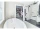 Elegant bathroom with soaking tub, walk-in shower, and large closet at 881 E 226Th St, Sheridan, IN 46069