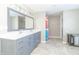 Modern bathroom with double vanity and walk-in shower at 881 E 226Th St, Sheridan, IN 46069