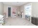 Bright bedroom with built-in shelving and window at 881 E 226Th St, Sheridan, IN 46069