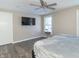 Bedroom with king-size bed, ceiling fan, and flat screen TV at 881 E 226Th St, Sheridan, IN 46069