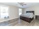 Bedroom with king-size bed, ceiling fan, and plenty of natural light at 881 E 226Th St, Sheridan, IN 46069
