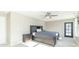 Charming bedroom with queen-size bed, ceiling fan and French doors at 881 E 226Th St, Sheridan, IN 46069