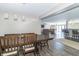 Open dining room with view into Gathering room and kitchen at 881 E 226Th St, Sheridan, IN 46069
