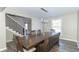 Bright dining room with a large wooden table and six chairs at 881 E 226Th St, Sheridan, IN 46069