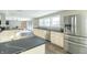 Modern kitchen with stainless steel appliances and granite countertops at 881 E 226Th St, Sheridan, IN 46069