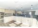 Modern kitchen with white cabinets and a large island at 881 E 226Th St, Sheridan, IN 46069