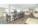 Open concept kitchen with breakfast bar and hardwood floors at 881 E 226Th St, Sheridan, IN 46069