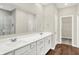 Bathroom featuring a double sink vanity, modern fixtures, and a walk-in shower at 9711 Palermo Ave, Indianapolis, IN 46239