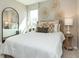 Cozy bedroom with wood bed frame and stylish decor at 9711 Palermo Ave, Indianapolis, IN 46239