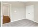 Light and airy bedroom with plush carpet, double closets, and hallway view adding depth at 9711 Palermo Ave, Indianapolis, IN 46239