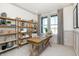 Bright home office features built-in shelving and a large window at 9711 Palermo Ave, Indianapolis, IN 46239