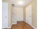 Light and airy entryway with wood floors and staircase at 10184 Cumberland Pointe Blvd, Noblesville, IN 46060