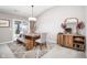 Farmhouse-style dining room with sliding doors leading to the patio at 10553 Pintail Ln, Indianapolis, IN 46239