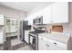 Bright kitchen with white cabinets and granite countertops at 10553 Pintail Ln, Indianapolis, IN 46239