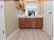 Bathroom with wood vanity and light fixture at 1061 Oak Leaf Rd, Franklin, IN 46131