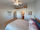 Comfortable bedroom with ceiling fan and access to a full bathroom at 15365 Mystic Rock Dr, Carmel, IN 46033