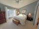 Spacious bedroom with large windows and a king-size bed at 15365 Mystic Rock Dr, Carmel, IN 46033