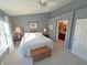 Bright bedroom with ensuite bathroom and king-size bed at 15365 Mystic Rock Dr, Carmel, IN 46033