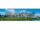 Spacious clubhouse with golf carts and a pond at 15365 Mystic Rock Dr, Carmel, IN 46033