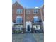 Brick front exterior of townhome with walkway and landscaping at 15365 Mystic Rock Dr, Carmel, IN 46033