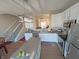 Modern kitchen with white cabinets, island, and stainless steel appliances at 15365 Mystic Rock Dr, Carmel, IN 46033