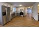 Modern kitchen with stainless steel appliances and light grey cabinets at 1608 Edgecombe Ave, Indianapolis, IN 46227