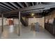 Finished basement recreational area with bar at 1716 Westwood Dr, Anderson, IN 46011