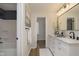 Modern bathroom with double vanity and a shower at 1716 Westwood Dr, Anderson, IN 46011