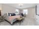 Relaxing bedroom with a comfy bed and a sitting area at 1716 Westwood Dr, Anderson, IN 46011