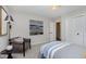 Cozy bedroom with a comfortable chair and built-in closet at 1716 Westwood Dr, Anderson, IN 46011