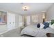 Serene bedroom with plush bedding and ample closet space at 1716 Westwood Dr, Anderson, IN 46011