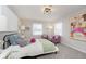 Charming bedroom with a comfy bed and colorful accents at 1716 Westwood Dr, Anderson, IN 46011