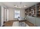 Sophisticated home office, built-in shelves, hardwood floors at 1716 Westwood Dr, Anderson, IN 46011