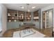 Stylish home office with built-in shelves and hardwood floors at 1716 Westwood Dr, Anderson, IN 46011