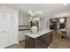 Island kitchen with granite countertops and stainless steel appliances at 1716 Westwood Dr, Anderson, IN 46011