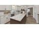 Island kitchen with granite countertops and stainless steel appliances at 1716 Westwood Dr, Anderson, IN 46011