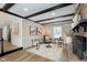 Bright living room with hardwood floors and a view into the kitchen at 1716 Westwood Dr, Anderson, IN 46011