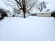 Large backyard covered in snow with footprint at 176 Monroe St, Indianapolis, IN 46229