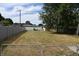 Large backyard with shed and high fence at 2606 13Th St, Columbus, IN 47201