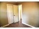 Bedroom with double doors to closet and access to bathroom at 2606 13Th St, Columbus, IN 47201