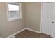 Bedroom with a closet and window, neutral wall colors at 2606 13Th St, Columbus, IN 47201