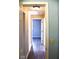 Bright hallway with light-colored walls and wood-look flooring at 2606 13Th St, Columbus, IN 47201