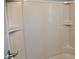 Clean bathtub and shower with built-in shelves at 2606 13Th St, Columbus, IN 47201