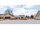 Tan house with brown garage door, winter view at 280 Christina Dr, Whiteland, IN 46184