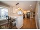 Modern kitchen with white shaker cabinets, quartz countertops, and stainless steel appliances at 319 W 46Th St, Indianapolis, IN 46208