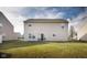 Spacious backyard with shed and neighboring houses at 3721 Rinehall Dr, Indianapolis, IN 46235