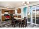 Kitchen with wooden cabinets and dining area at 3721 Rinehall Dr, Indianapolis, IN 46235