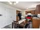 Kitchen with wooden cabinets and dining area at 3721 Rinehall Dr, Indianapolis, IN 46235