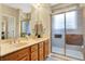 Bathroom features double sinks and a glass enclosed shower at 4343 Raintree Blvd, Greenwood, IN 46143