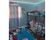 bedroom with bunk beds and a colorful rug at 4715 E 33Rd St, Indianapolis, IN 46218